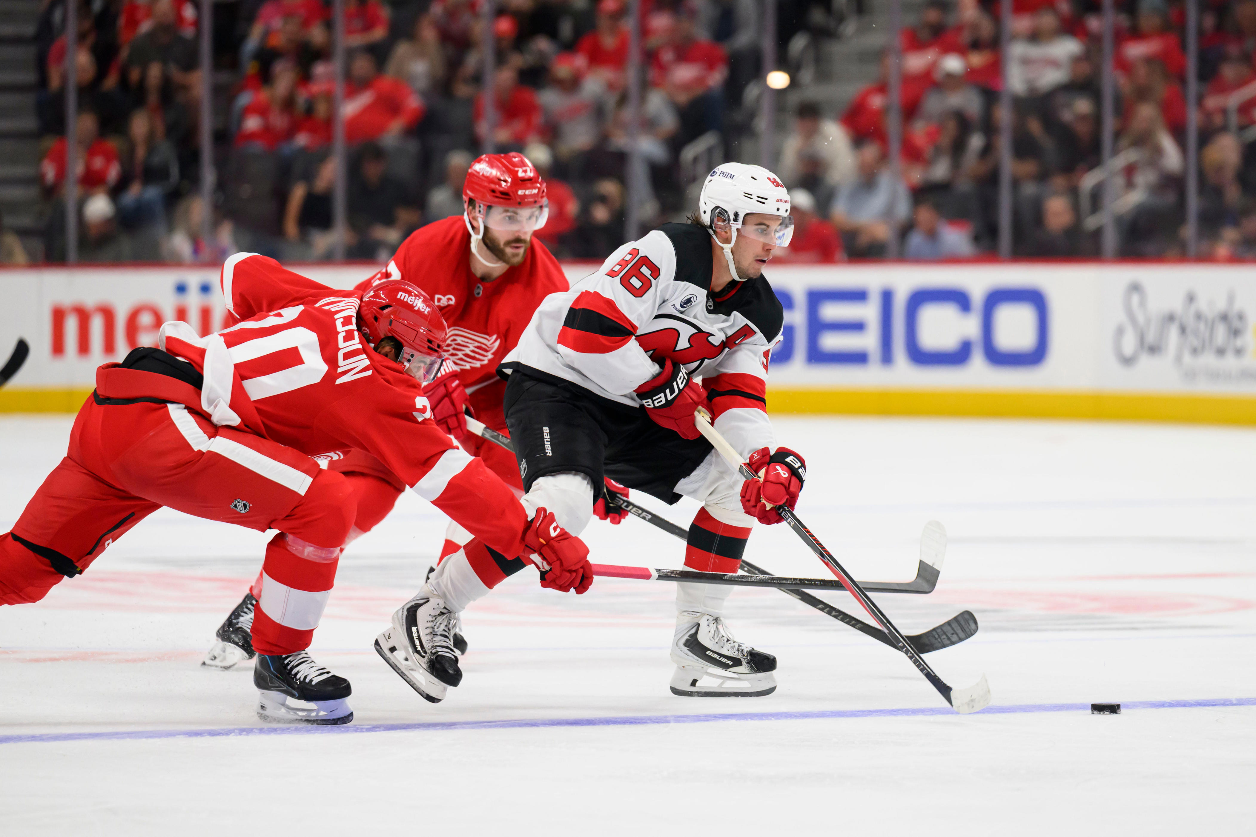 Red Wings earn a point but lose in overtime to Devils 5-4