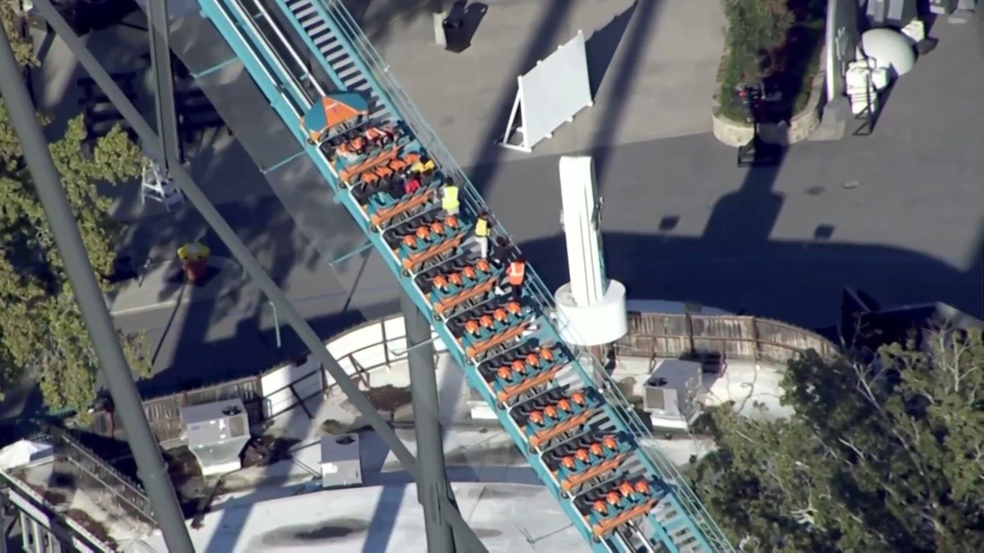 Six Flags temporarily suspends rides at parks across the country after ...