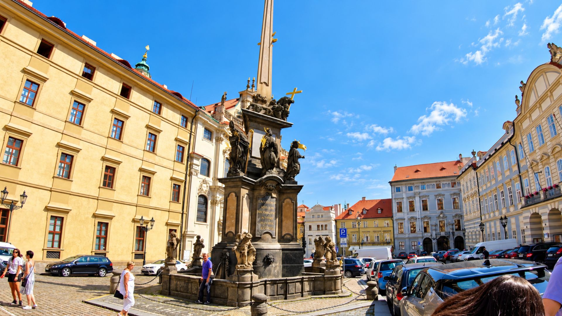 Prague's historic square with a towering baroque monument (4K)