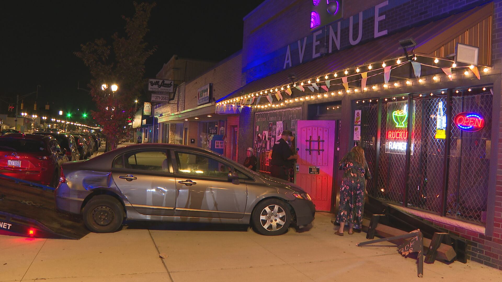 Police investigating hit-and-run that caused car to crash into Avenue Cafe