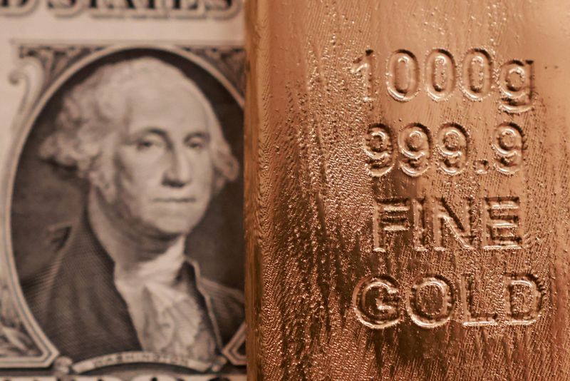 Gold drops over 1% as hot US inflation data boosts Fed hike bets