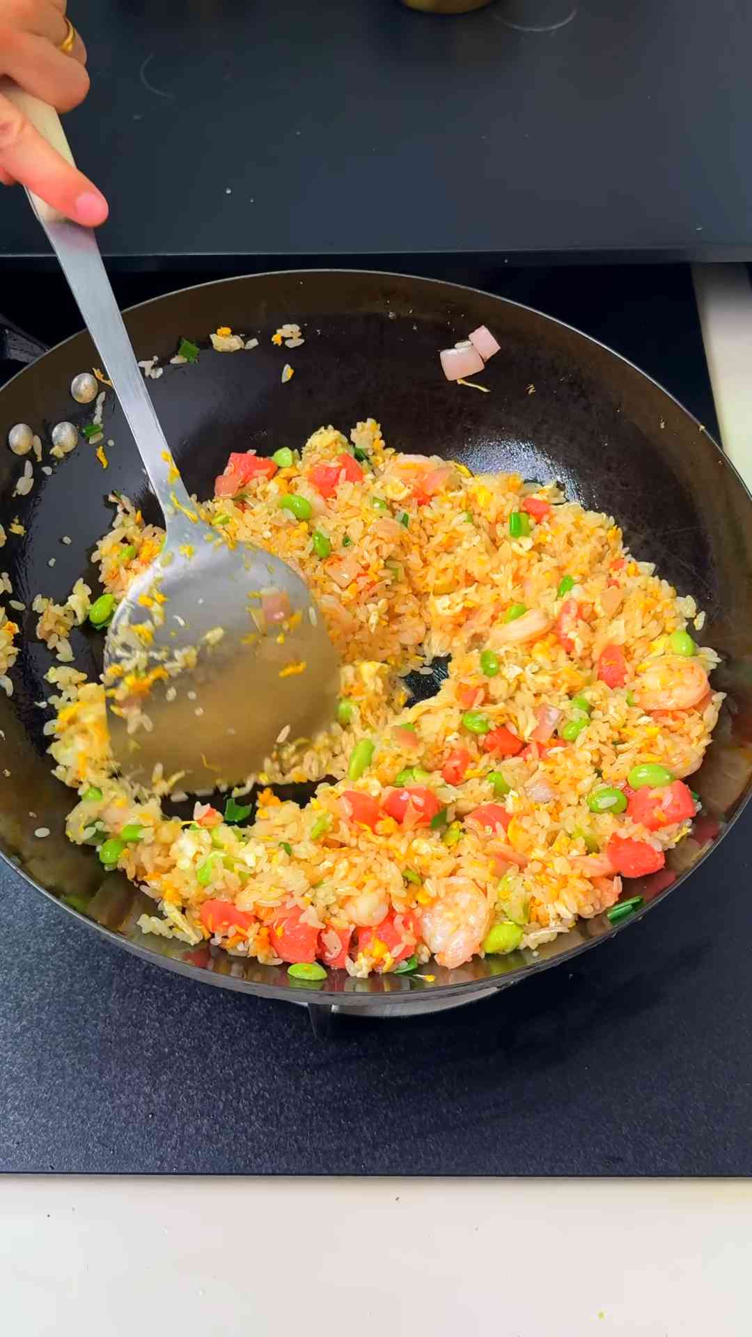 Shrimp and sausage fried rice with crispy egg