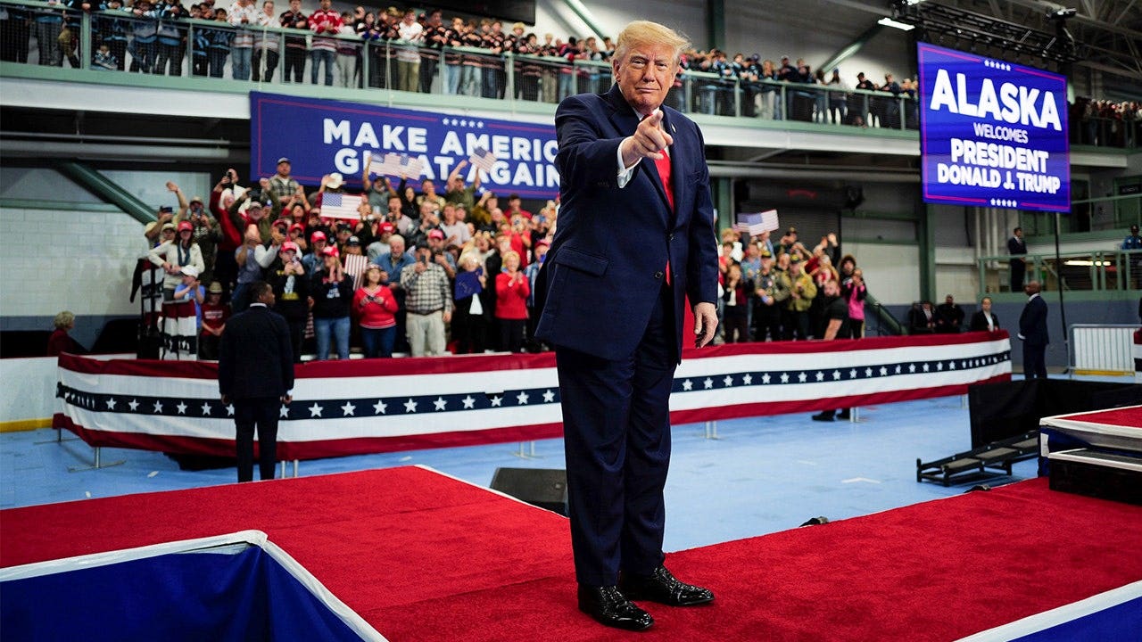 Trump signs pardons for Alaska diesel mechanics onstage during rally ...