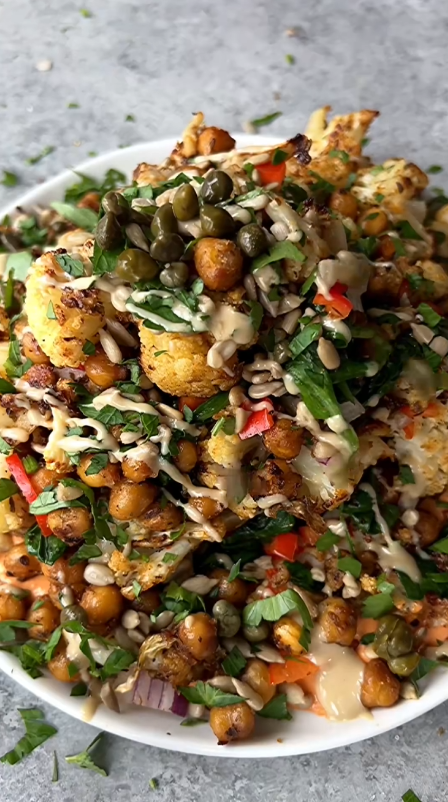 Roasted cauliflower chickpea salad with whipped pepper tahini