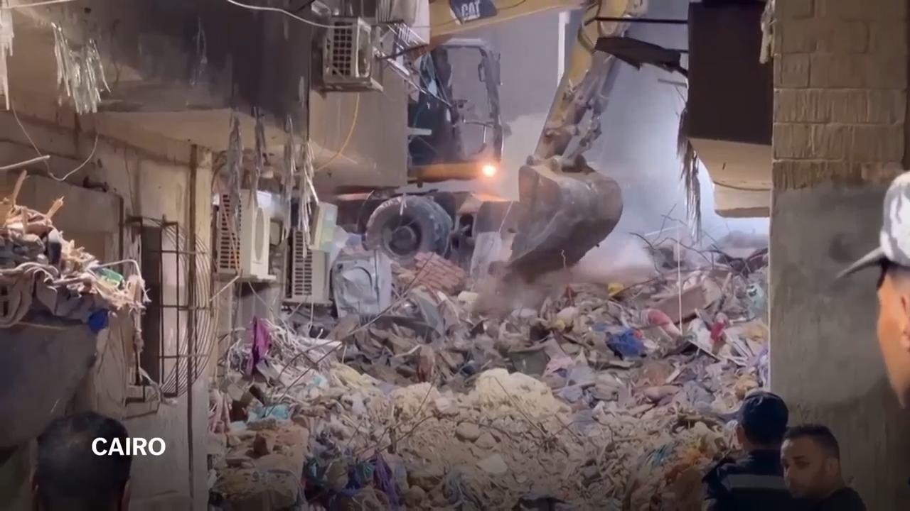 Search for survivors after five-storey building collapses in Cairo