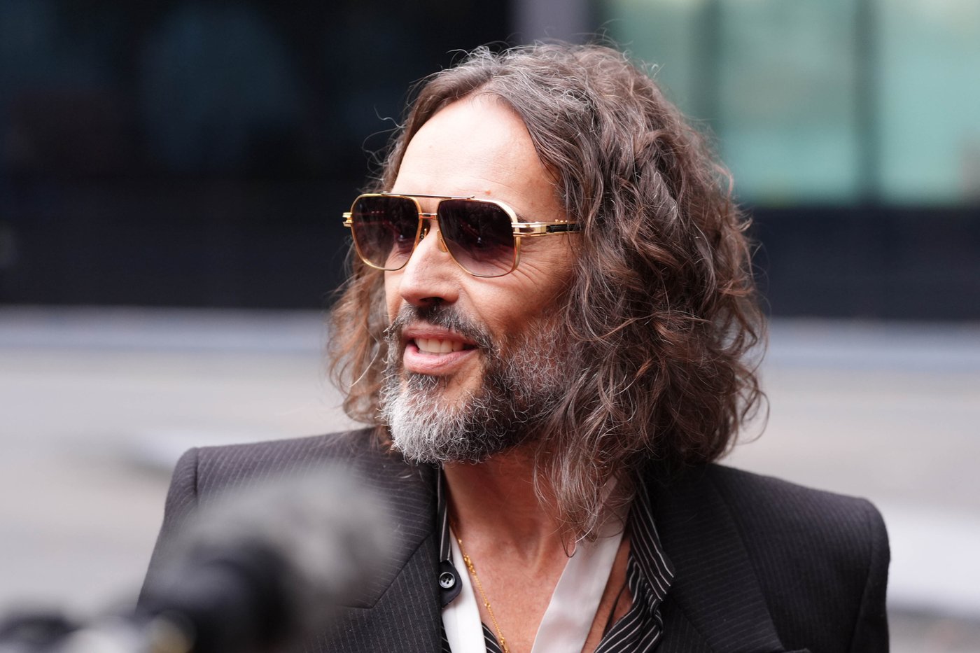 Prosecution labels Russell Brand a ruthless sexual predator at opening ...