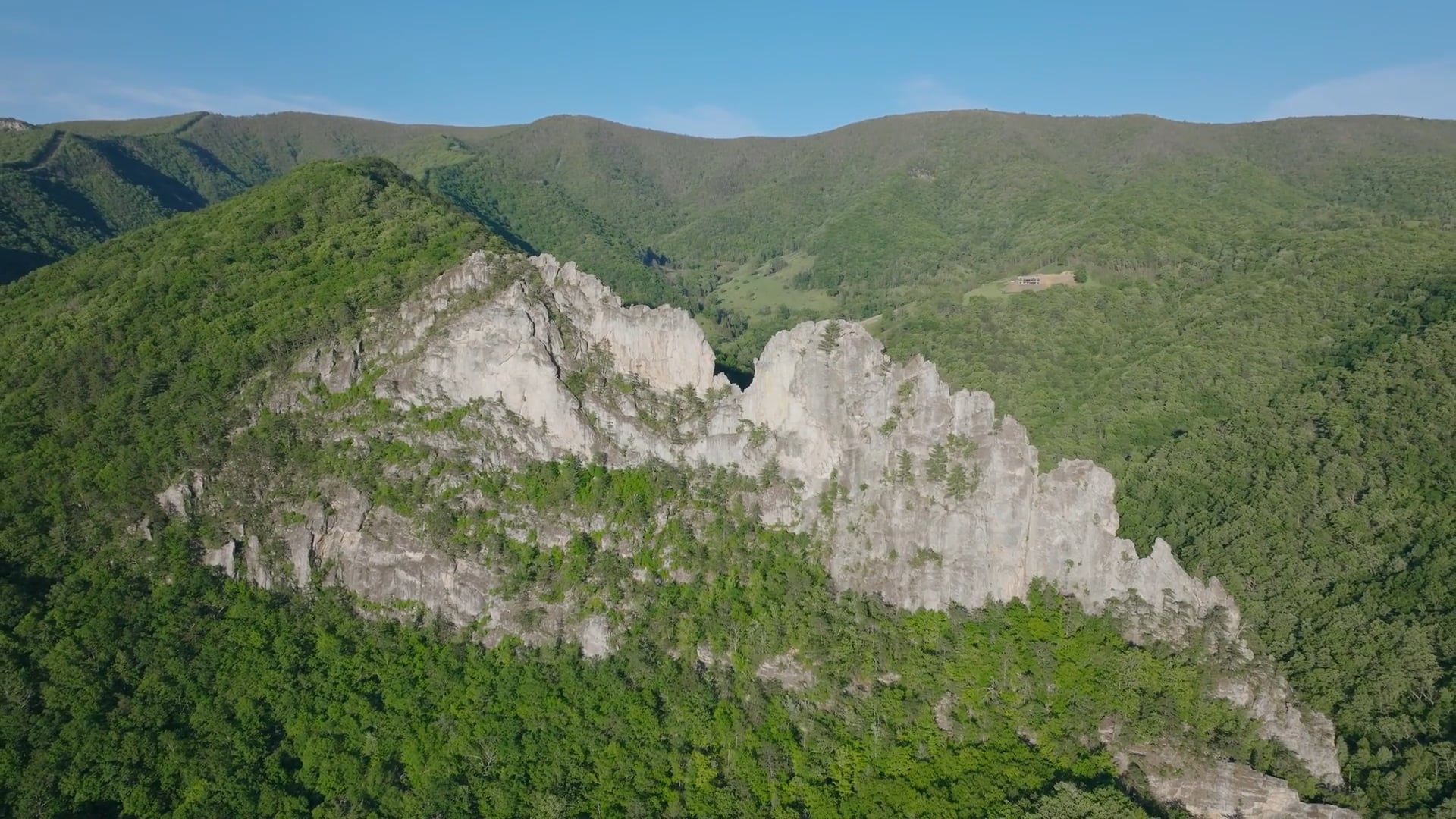 Drone soars through the Appalachian sky, Seneca Rocks, United States