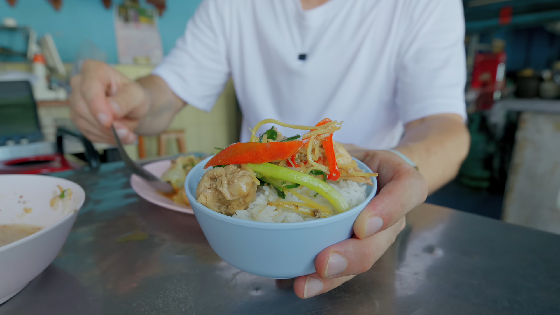 Savoring Thai ginger chicken stir fry with fragrant rice and sesame oil