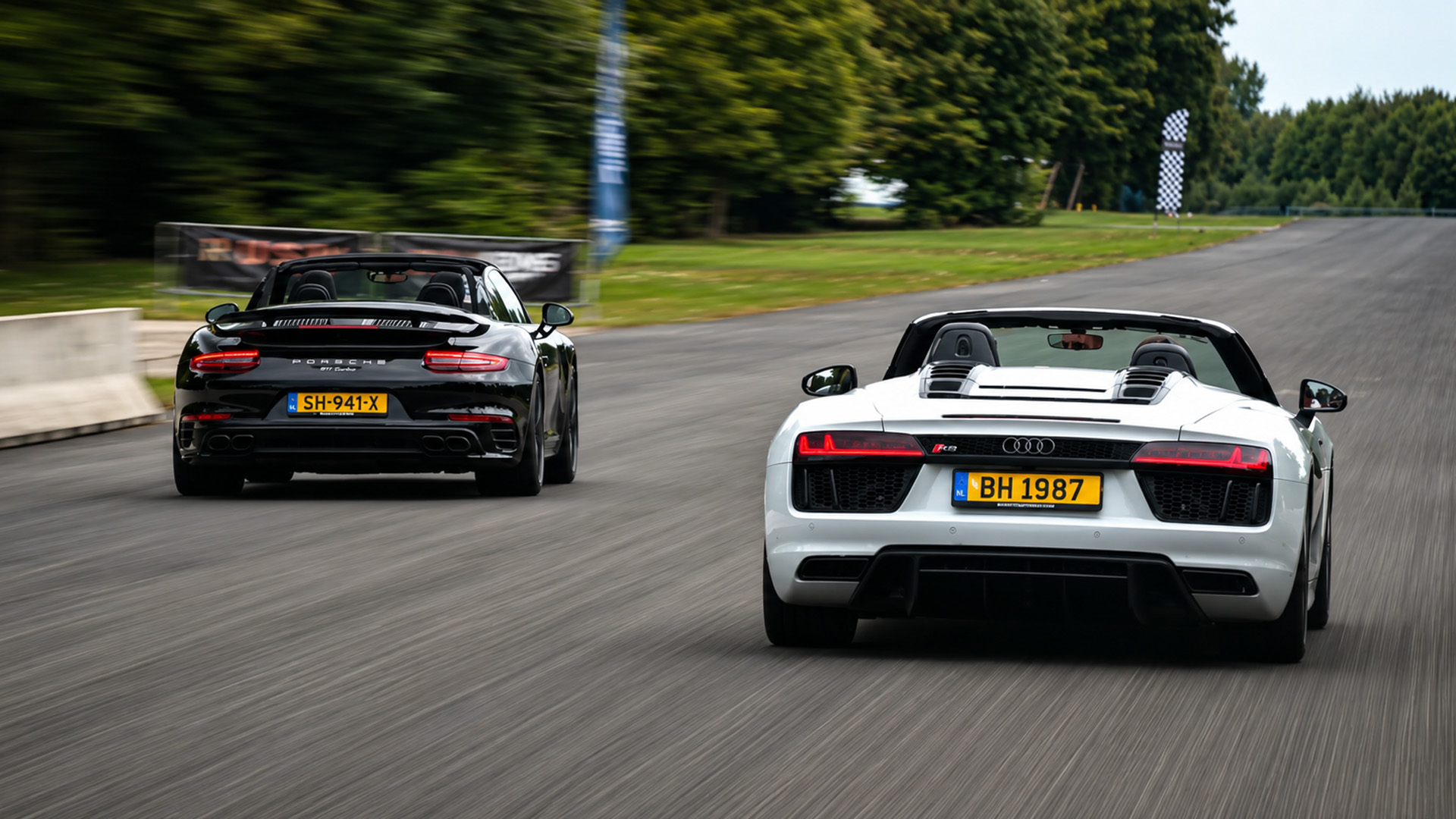 V10 vs turbo power in an Audi R8 and Porsche 911 drag race