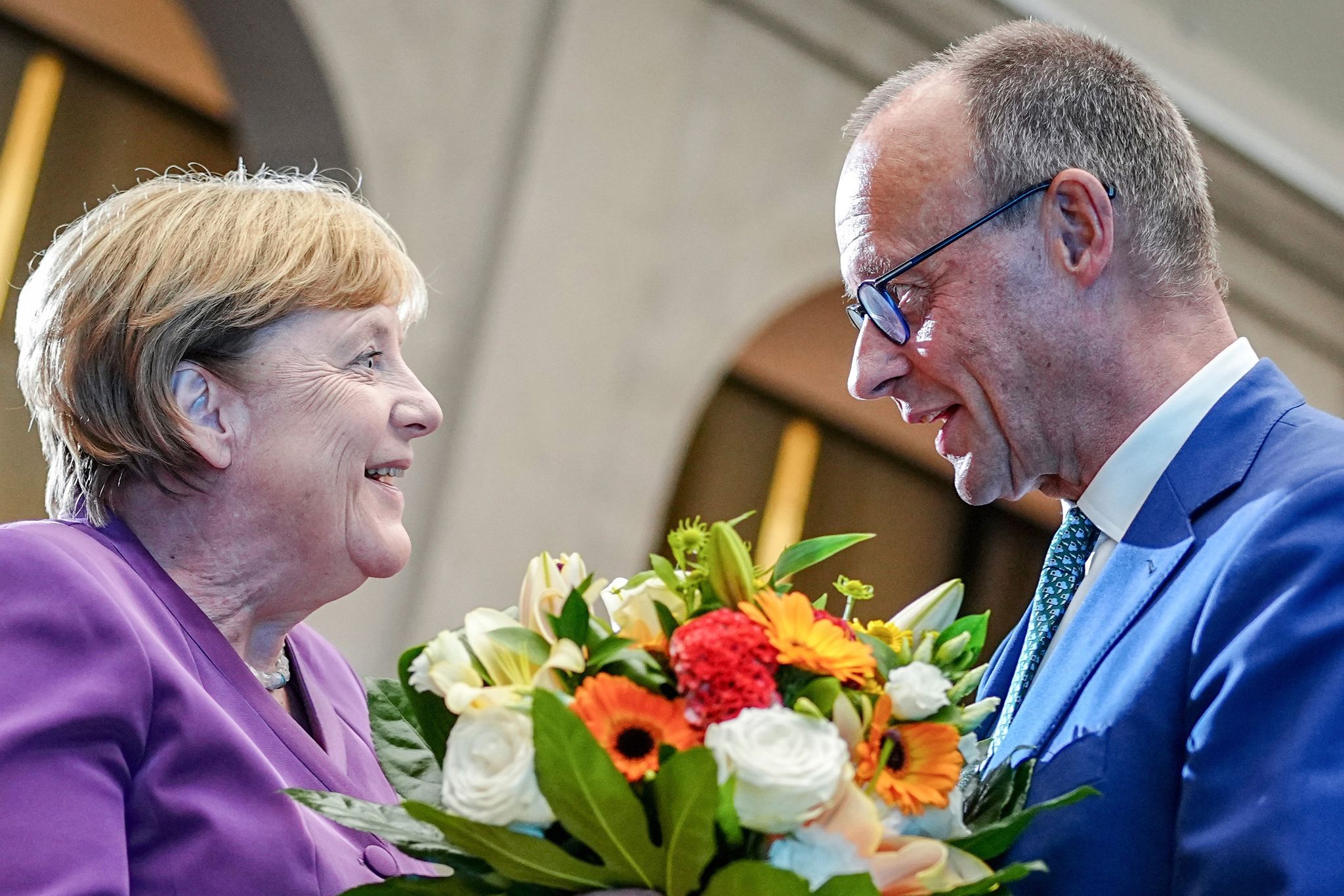 Merkel promotes democracy and compromise to pupils