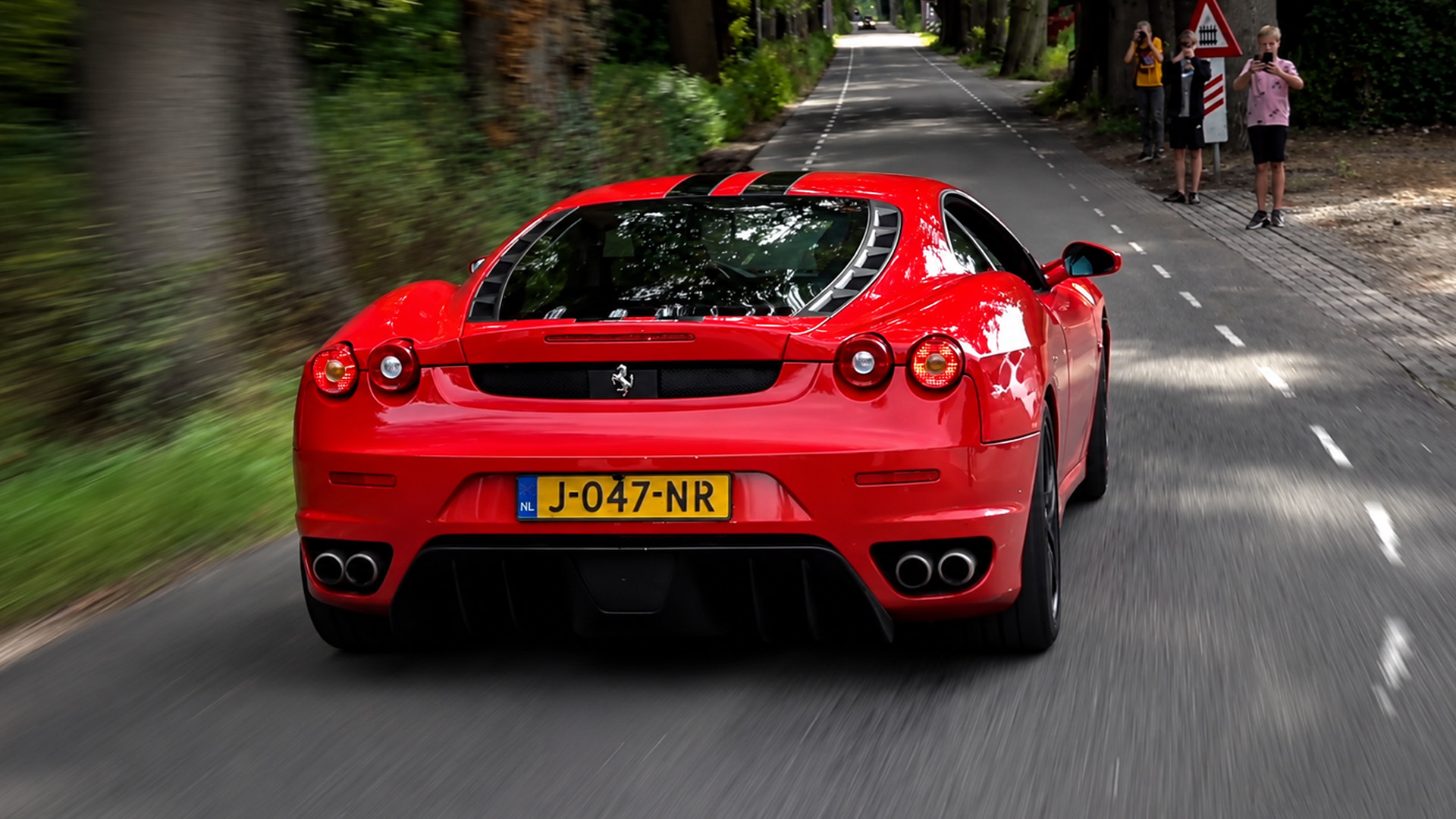 The Ferrari F430 Scuderia brings raw V8 power to the streets