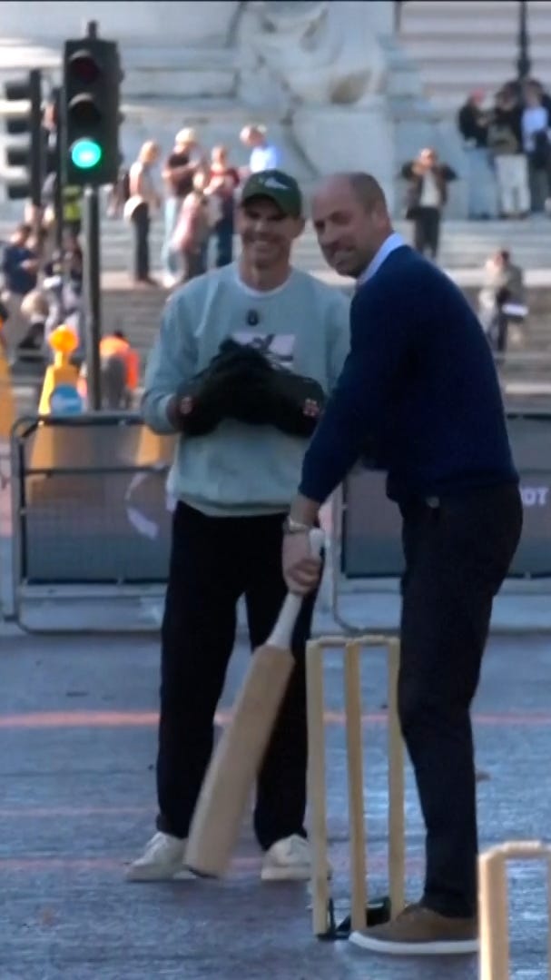 Prince William grabs a bat for cricket match outside Buckingham Palace ...