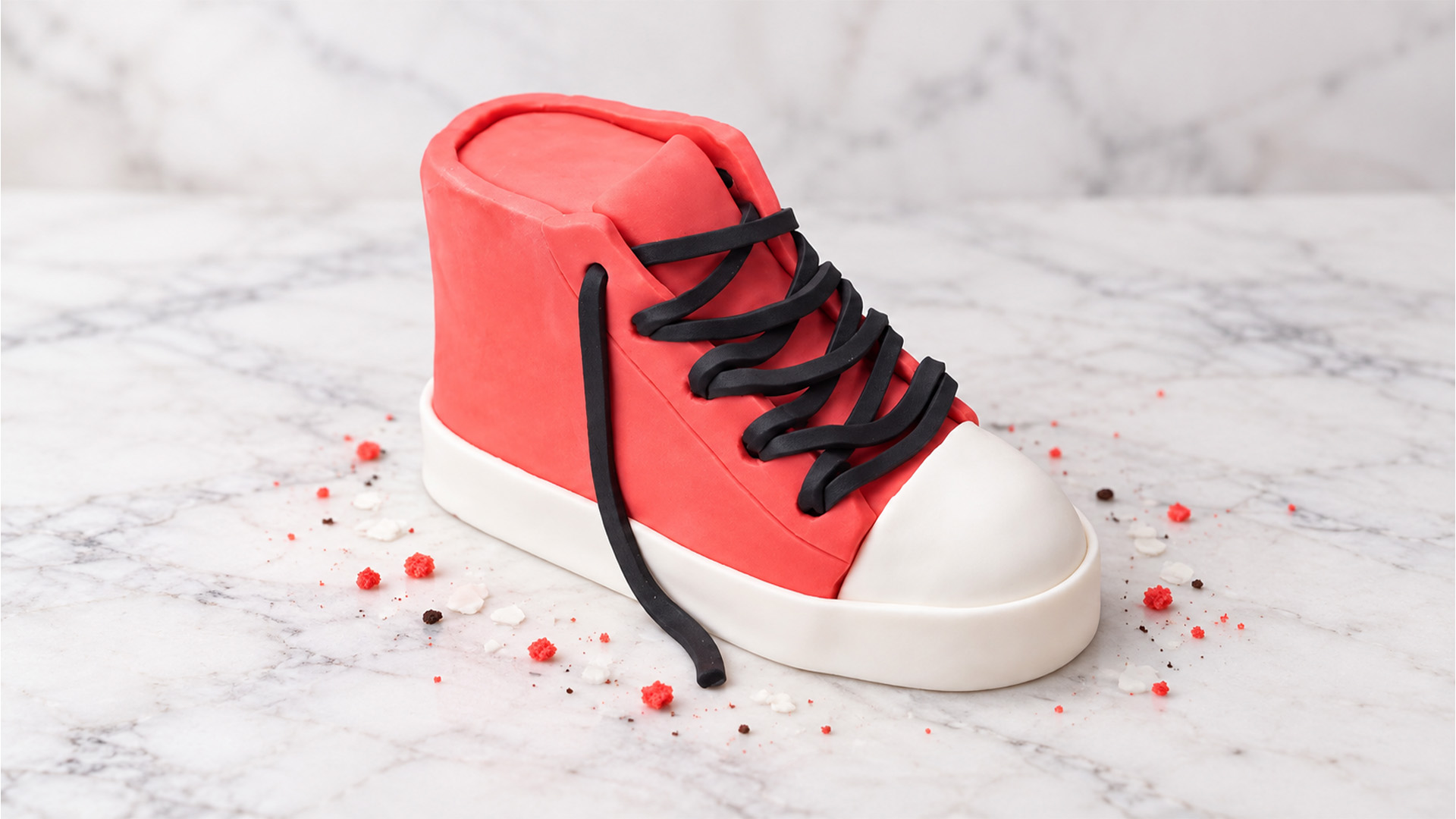 Pink high top sneaker cake with chocolate layers