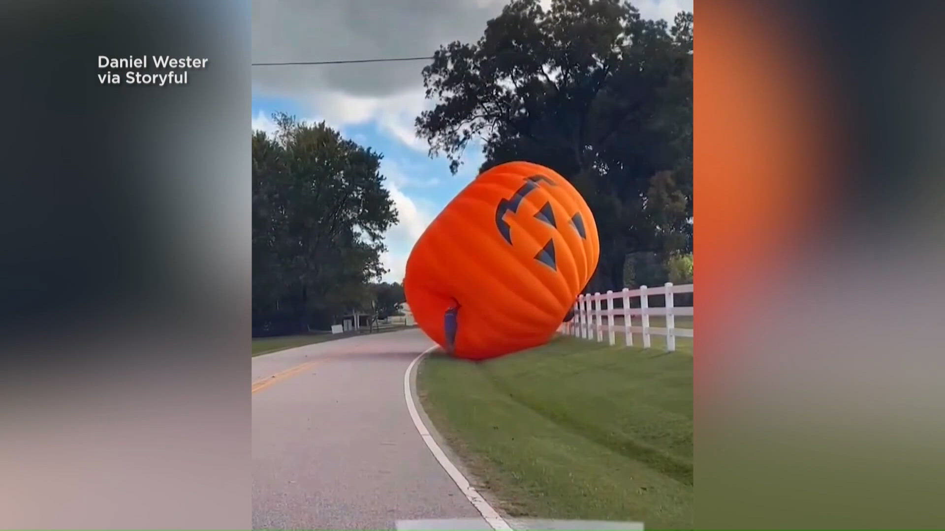 Gusty winds send giant pumpkin inflatable on a roll