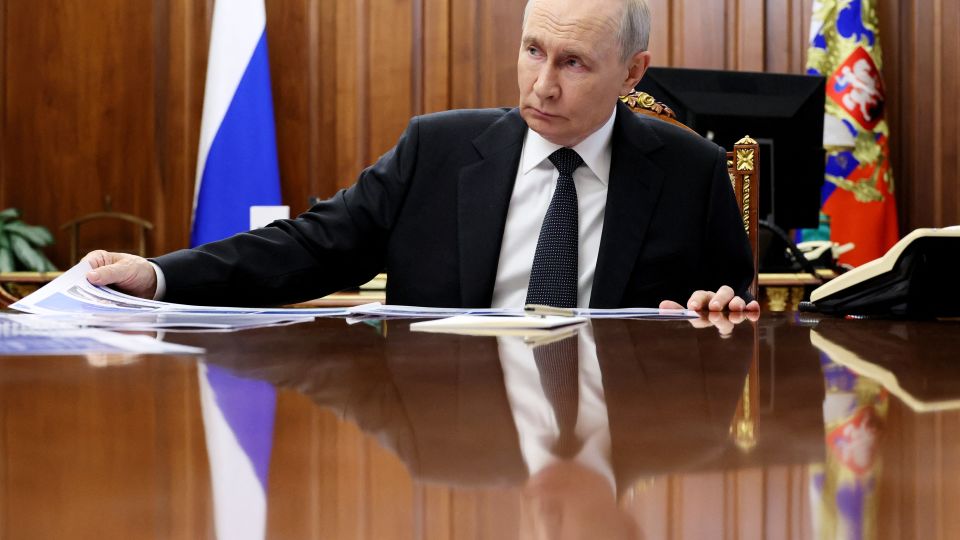 Russian President Vladimir Putin attends a meeting with Russian Minister of Transport in Moscow on October 13. - Mikhail Metzel/AFP/Pool/Getty Images