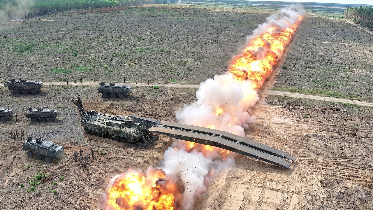 NATO troops in action: Crossing massive bridge built under extreme ...