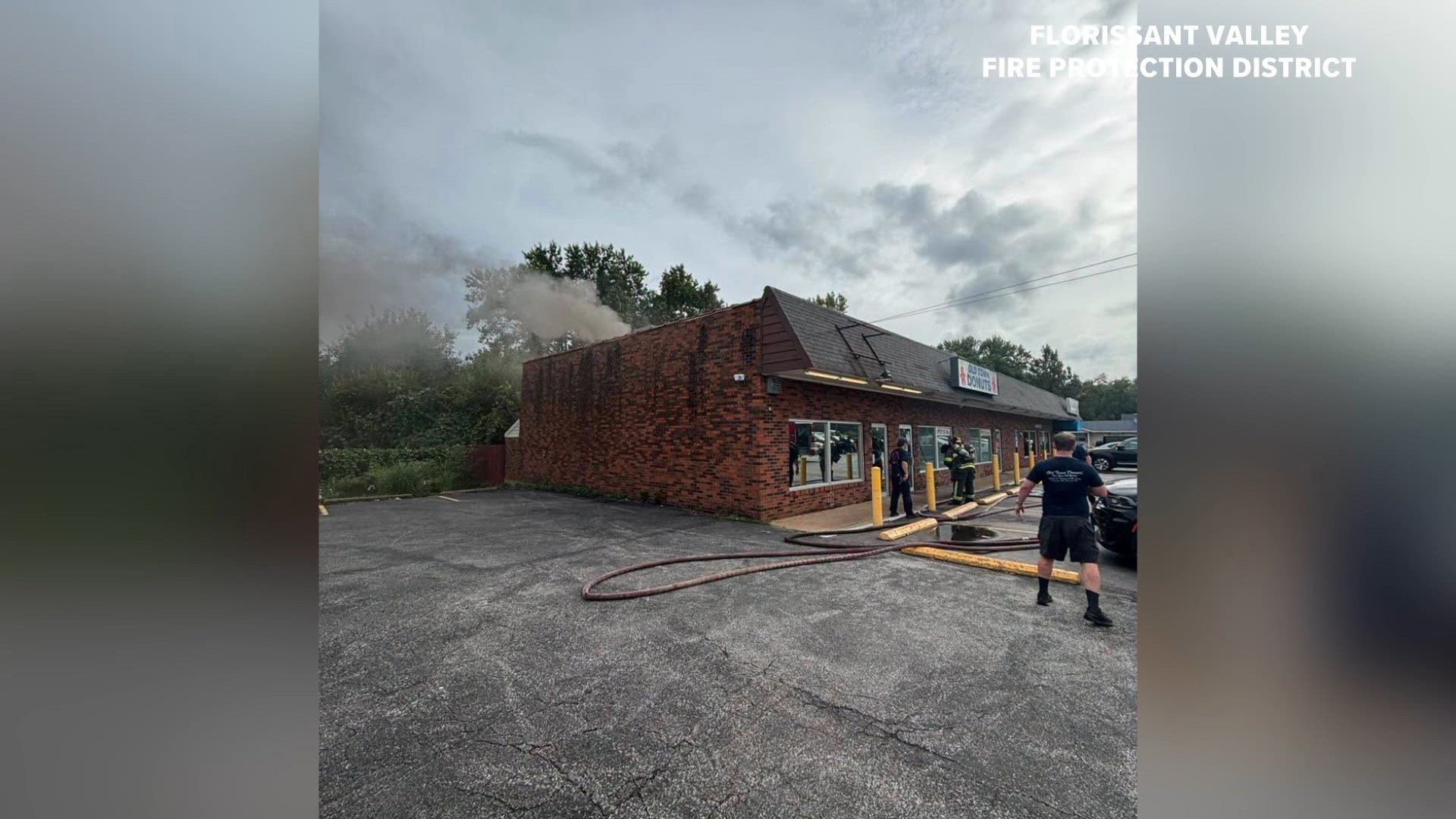Smoke, flames spotted from Old Town Donuts near N Florissant Road