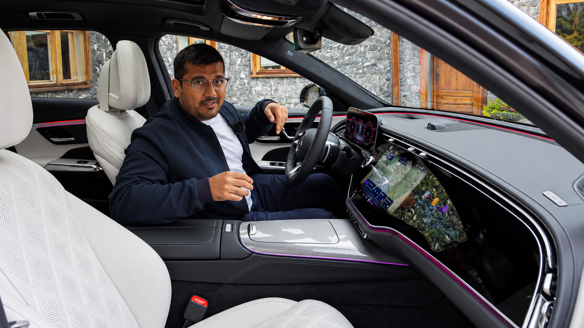 Mercedes E-Class estate showcases a luxurious cabin with white seats