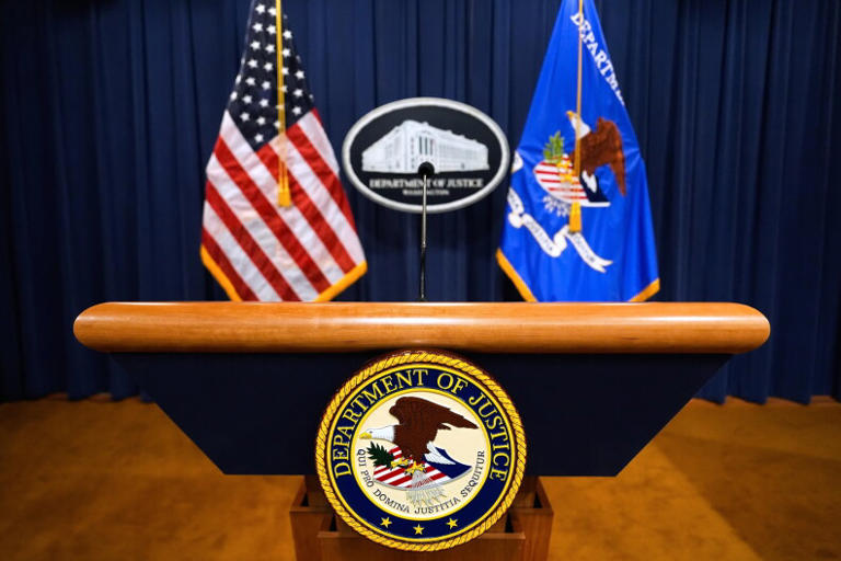 Judge denies the Justice Department’s bid to stop processing 20,000 ...