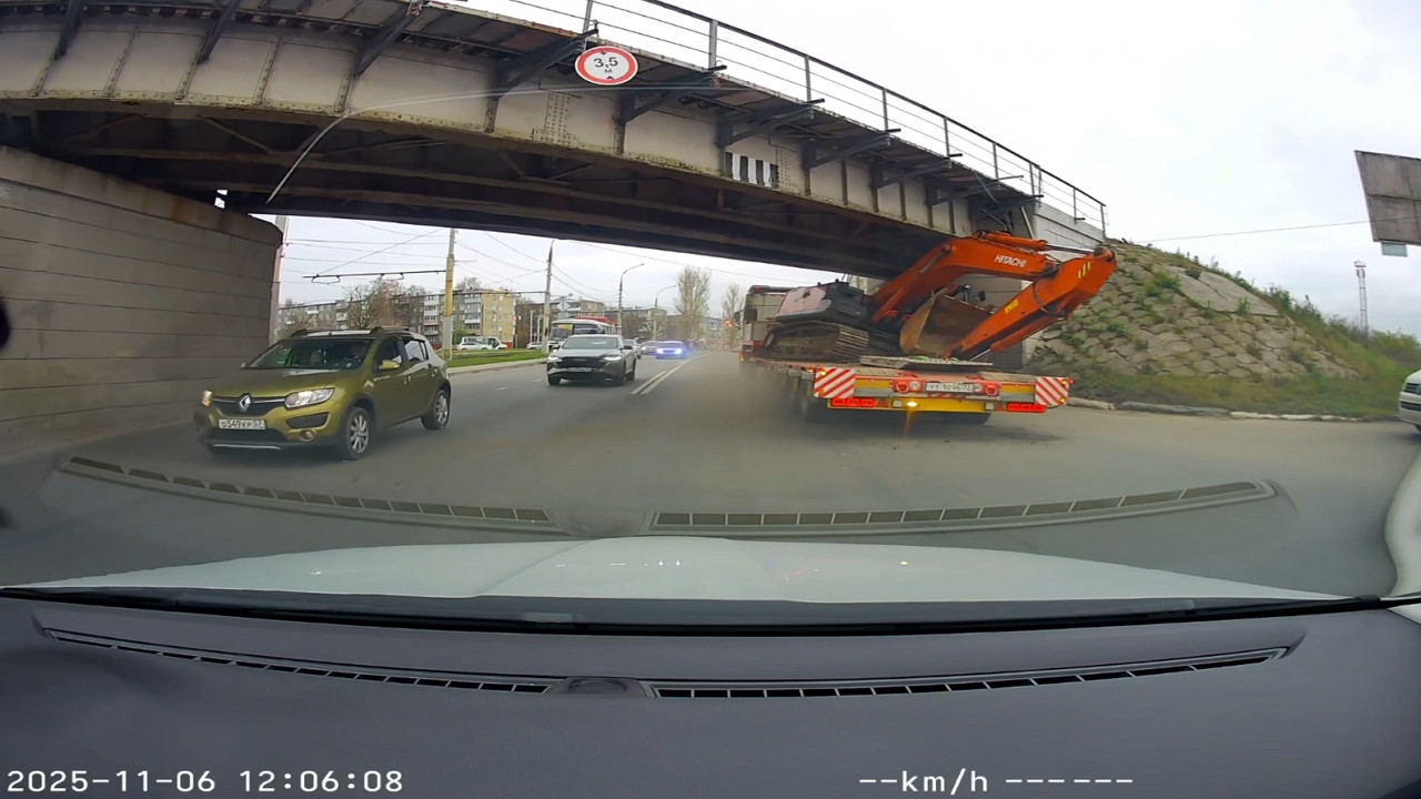 Truck stuck under low railway bridge in Oryol, Russia