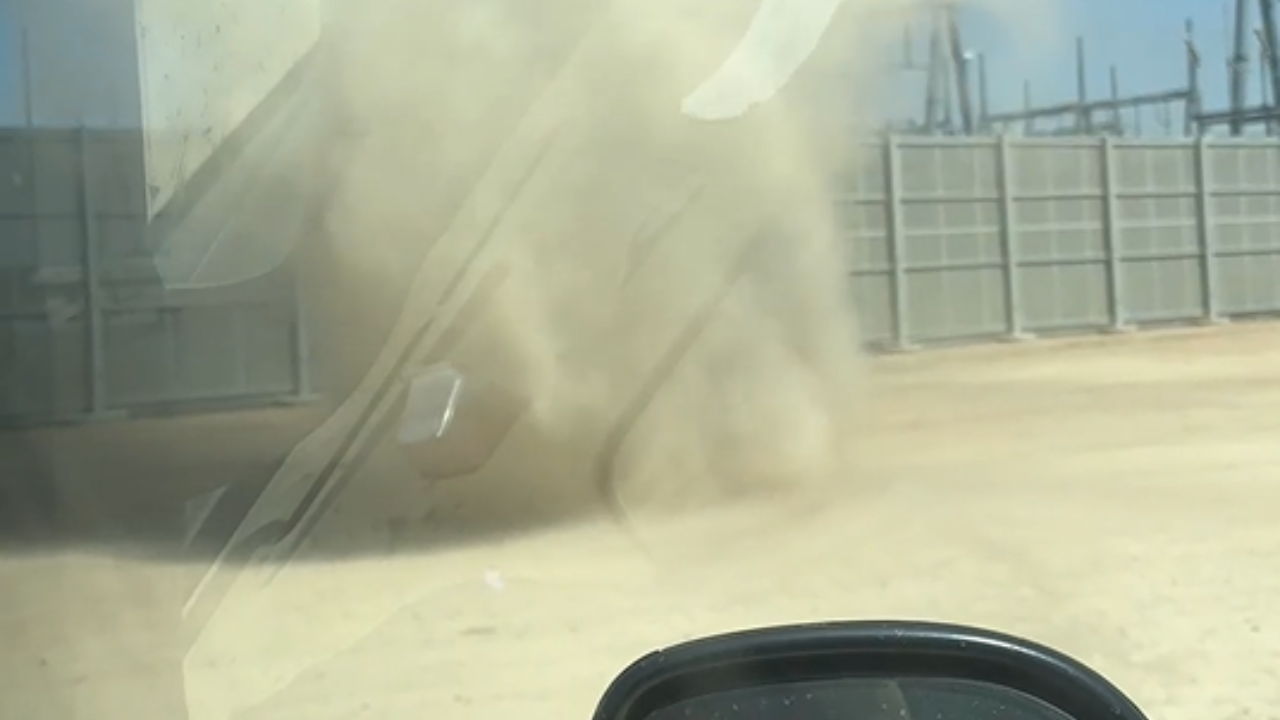 Localized dust vortex appears near vehicle before vanishing