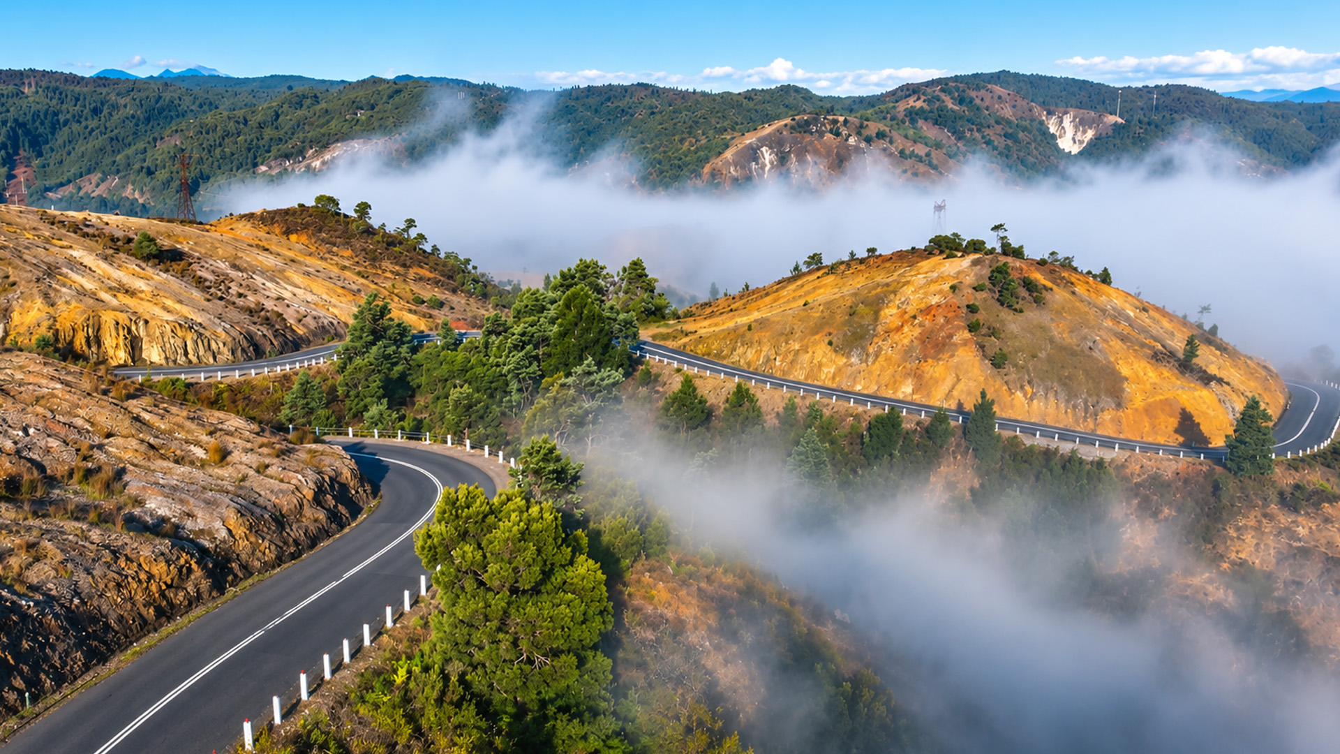 How do drivers navigate this foggy mountain road?