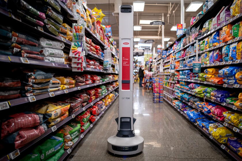AI robots are roaming LA grocery aisles. Shoppers and workers are worried