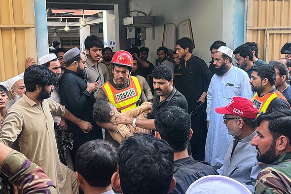 Horror as school roof collapse kills at least 29 sparking frantic ...