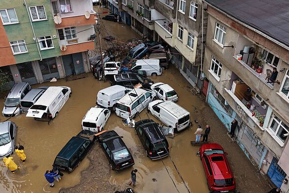 Istanbul horror as floods put city underwater with cars flipped and ...