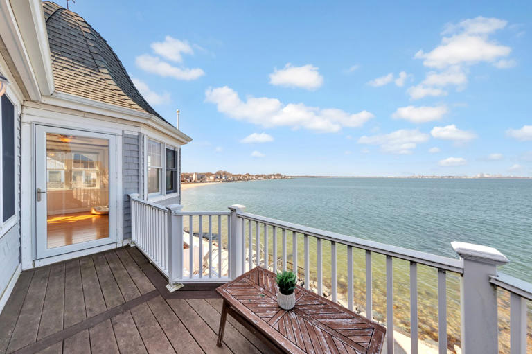 The waterfront home has four bedrooms and measures about 2,700 square feet.