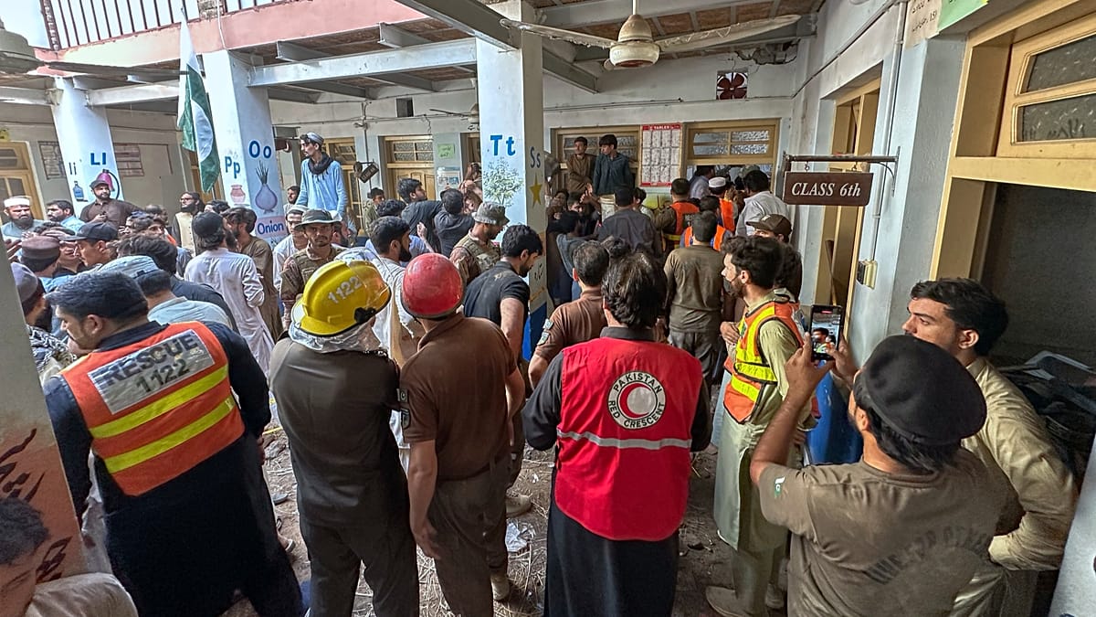 School roof collapse kills teacher and at least 32 children in ...