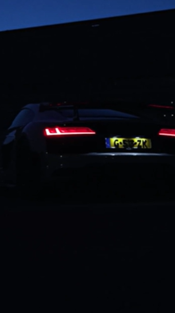 Audi R8 on a nighttime drive with a dark, cinematic atmosphere