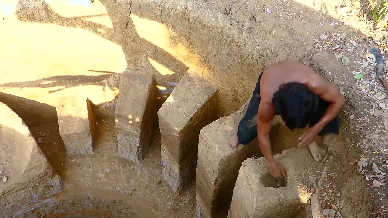 Hand-carved underground temple pool built deep in the Cambodian forest