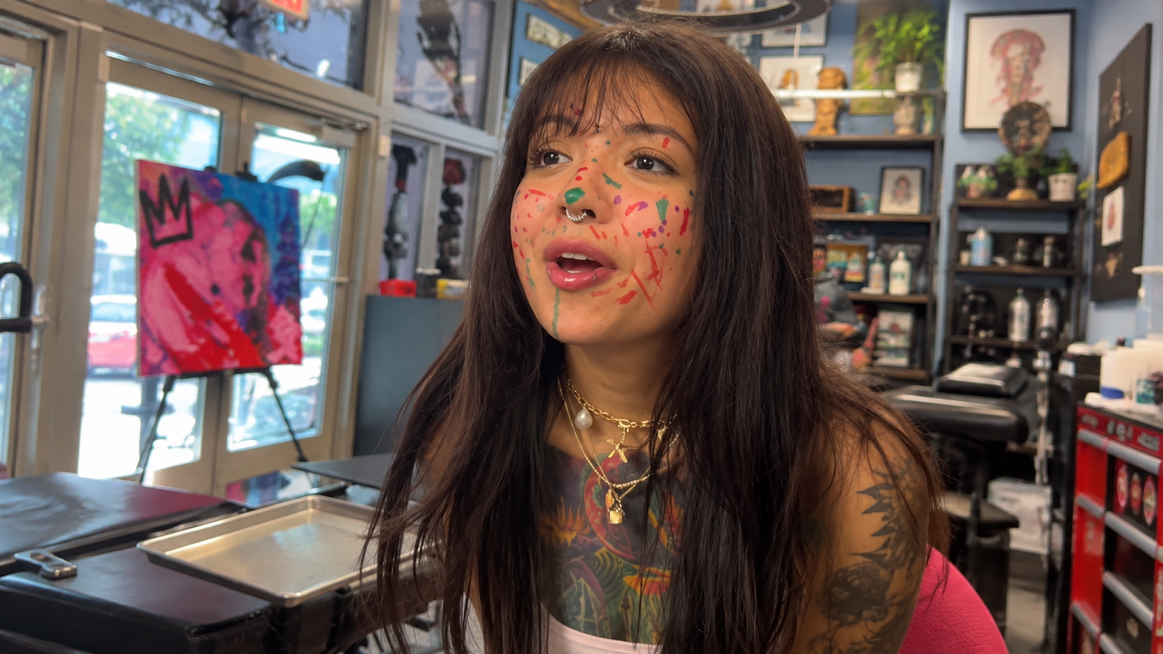 She paid $300 for a tiny white face tattoo - and the artist was speechless