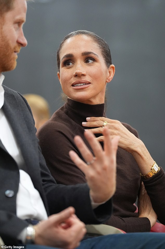 Harry and Meghan were clinging together like survivors in Nottingham ...