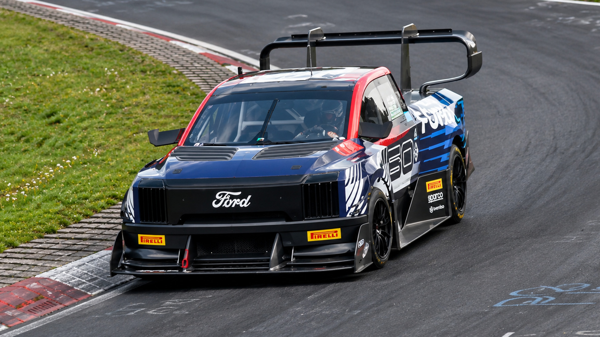 Camouflaged performance cars fill the Nürburgring during prototype testing