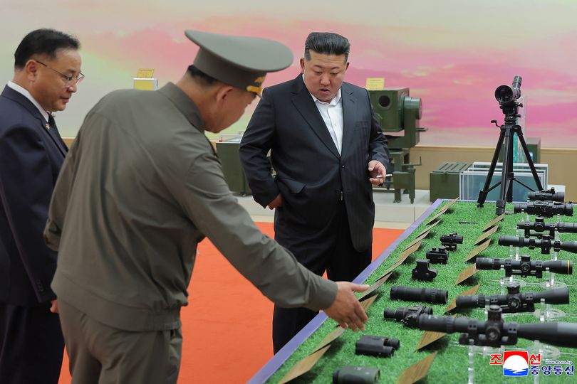 Kim Jong-un reappaears after major health fears as he's seen ogling ...