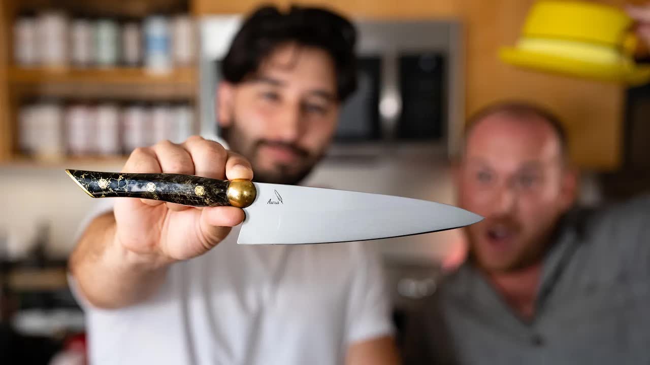 Lisa Nguyen prepares oysters with an impressive chef's knife