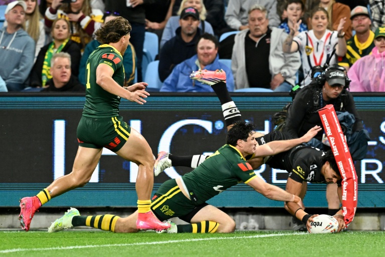 Holders Australia edge New Zealand 24-22 to open Rugby League World Cup