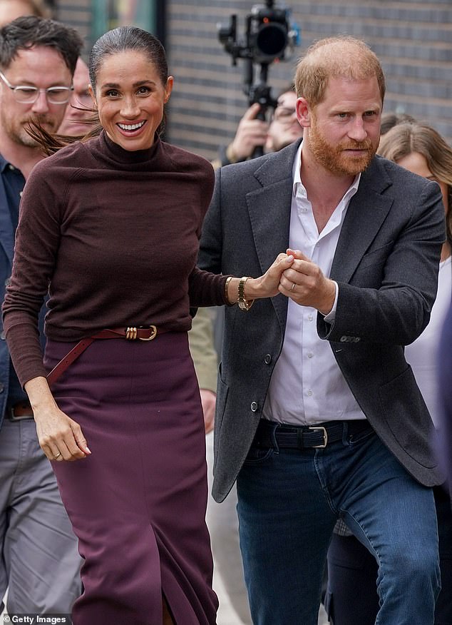 Harry and Meghan were clinging together like survivors in Nottingham ...