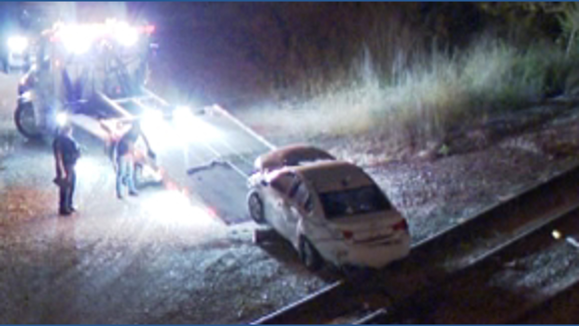 Overnight crash leaves vehicle on Northwood railroad tracks