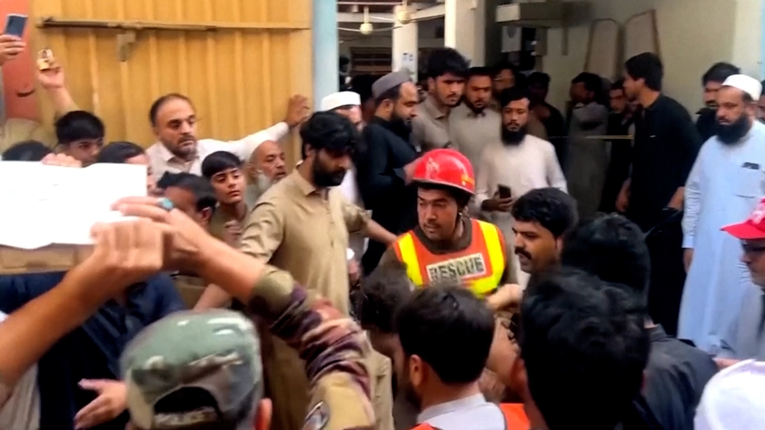 School roof collapse in Pakistan kills 33, injures dozens