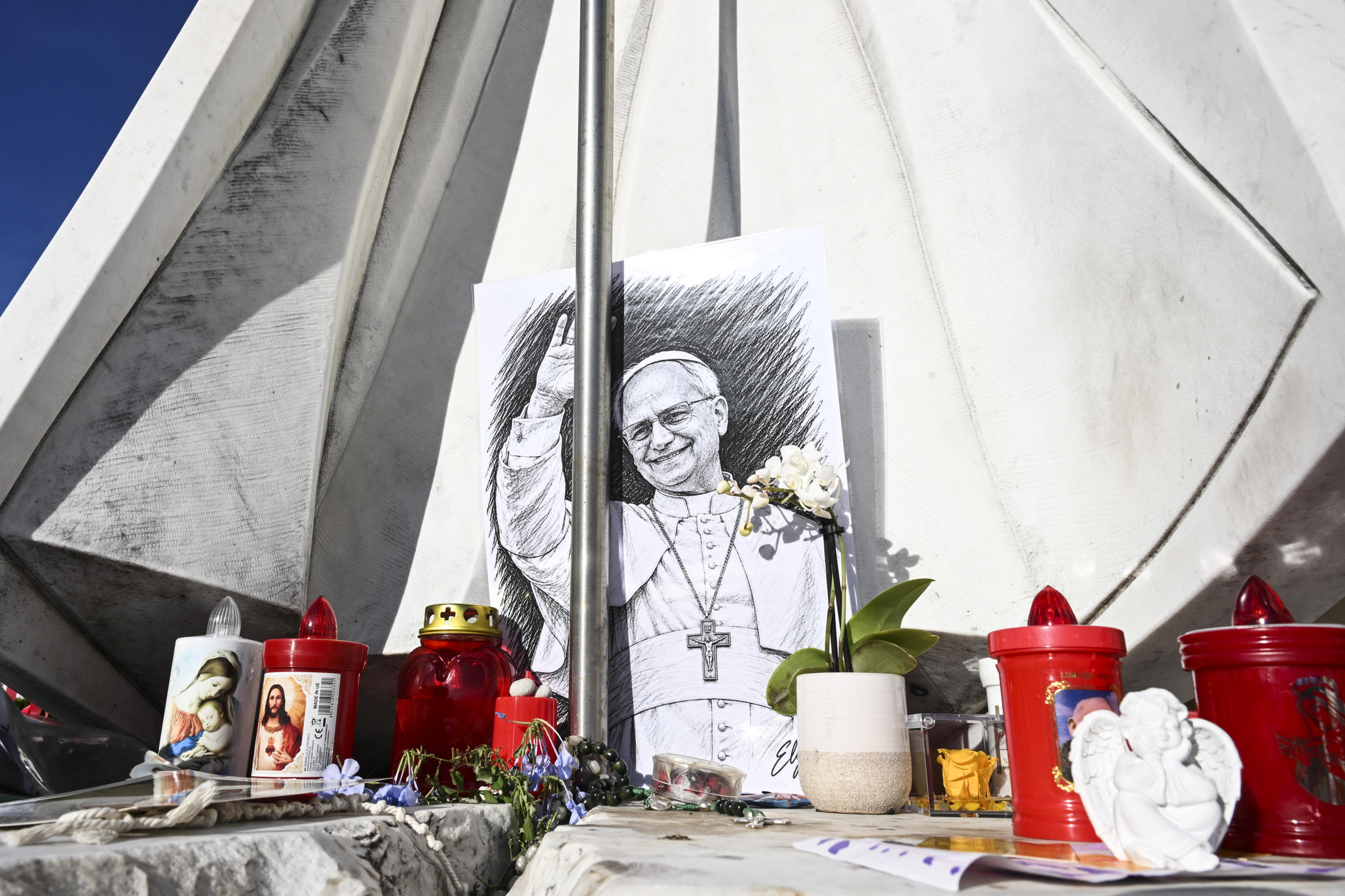 Flowers, letters, and children's drawings for pope at Gemelli Hospital