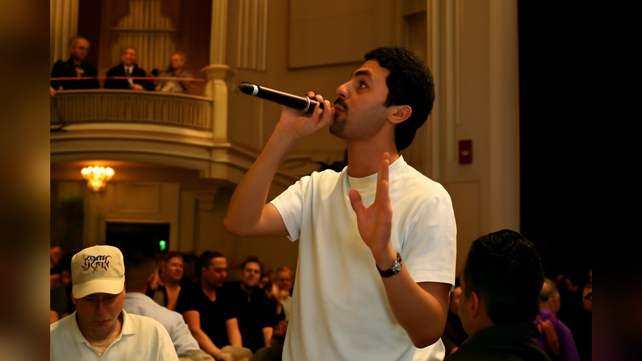 Morgan Jay's camera guy Masih gets numbers during a Boston show
