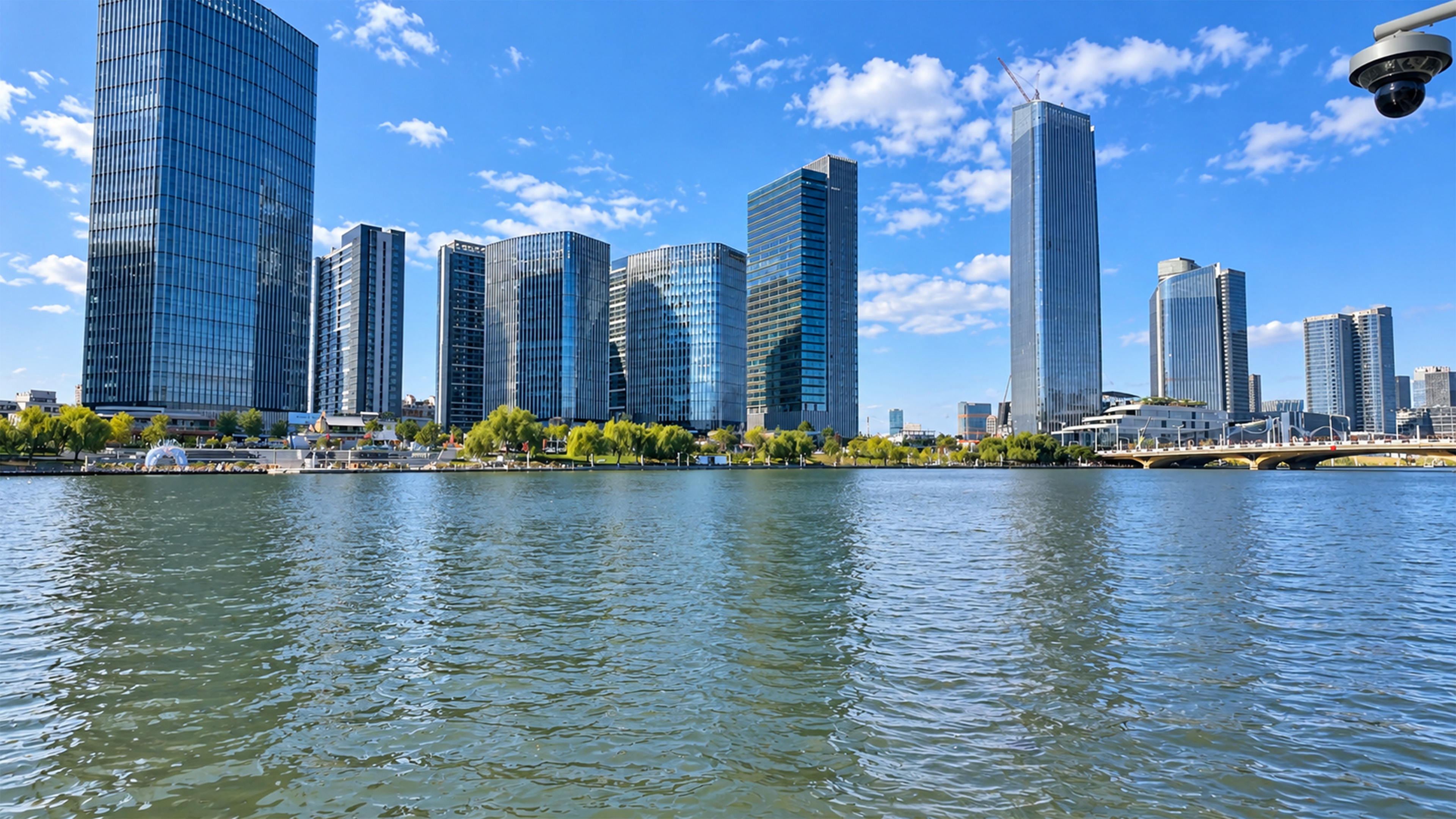 Modern skyscrapers frame this quiet waterfront scene in China