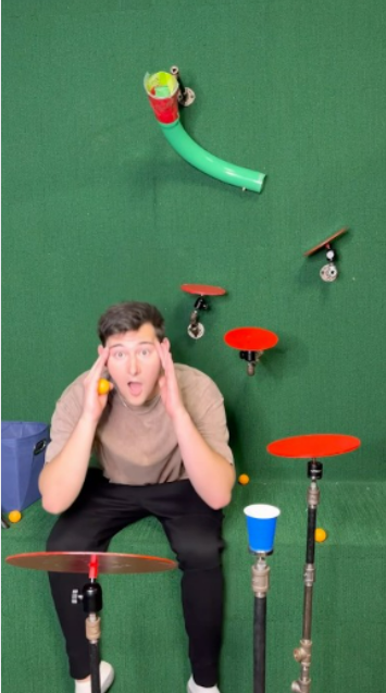 Watch a ping pong ball pull off this clever trick shot