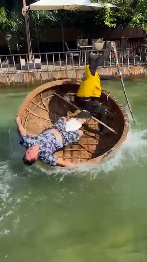 Boat operator falls onto tourist during basket boat ride