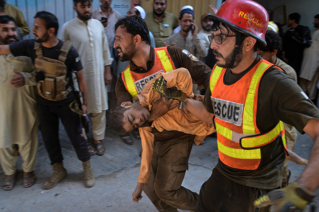 School roof collapse in Pakistan kills at least 35 and injures more than 50