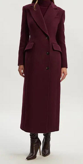 Meghan just stepped out in a very Princess Kate coded burgundy outfit