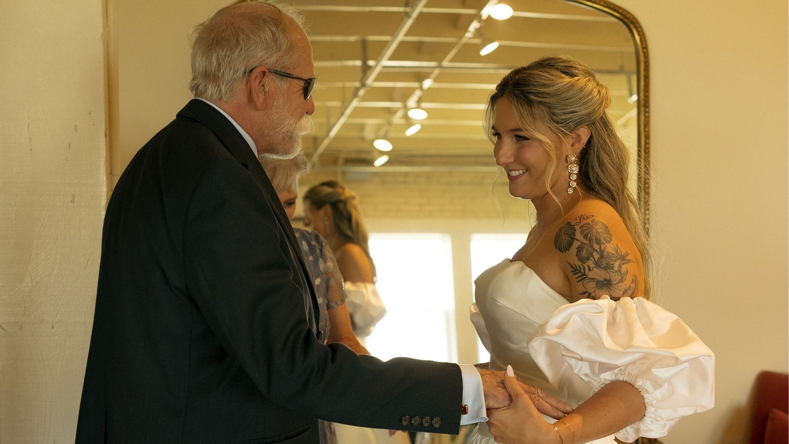 Bride has emotional first-touch moment with blind father on wedding day